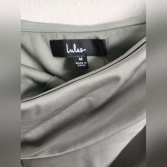 Showing Off a Little Sage Green Asymmetrical Tulip - Picture 7 of 8